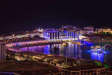 Fototapeta na wymiar Ariel view of Bahrain's luxury Reef island and Lagoon Beach at night.