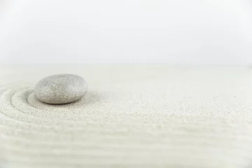 Fotobehang Zen Stenen Zen garden. Pyramids of white and gray zen stones on the white sand with abstract wave drawings. Concept of harmony, balance and meditation, spa, massage, relax.  © strigana