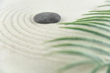 Fotobehang Zen Stenen Zen garden. Pyramids of white and gray zen stones on the white sand with abstract wave drawings. Concept of harmony, balance and meditation, spa, massage, relax.  © strigana