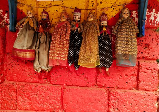 Traditional Homemade Puppets On Wall 