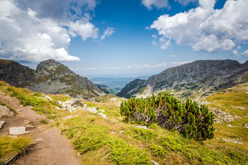 Beautiful mountain scenery in a sunny summer day. Rila mountain, Bulgaria. Hiking/ trekking concept.