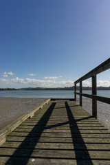 Obraz premium Wooden bridge over the sea