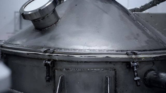 Metal vacuum tank at the factory for the manufacture of products. Industry concept