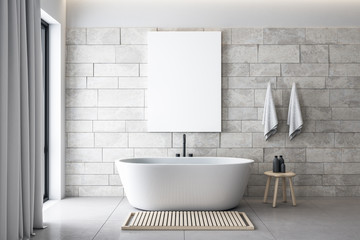 Minimalistic bathroom with blank poster on wall