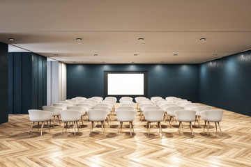 Minimalistic interior of a presentation room with white chairs and blank screen