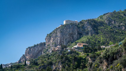 Fototapeta na wymiar Luxury villas sit on the Amalfi coastline, Italy.