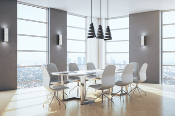 Minimalistic meeting room with panoramic city view.