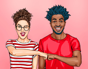 Friends give fist bump, agree to work together, have happy facial expressions rejoice success and cooperation, have toothy smiles, isolated over purple background. Team work concept - obrazy, fototapety, plakaty