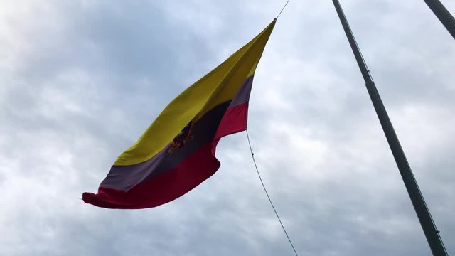 Ecuador Flag Waving In The Sky, Held By A Rope. Bandera De Ecuador Ondeando En El Cielo, En Las Peñas Guayaquil.