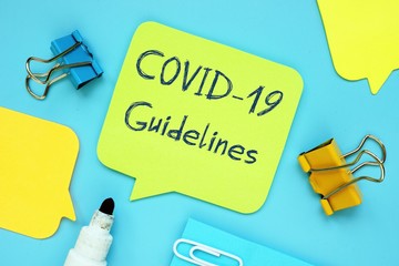 Conceptual photo about covid guidelines with written phrase.