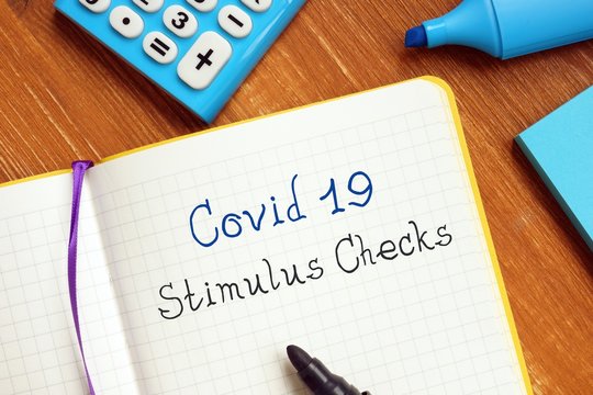 Conceptual Photo About Covid 19 Stimulus Checks With Written Text.