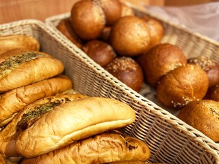 Fresh bread, rolls, cookies and other pastries. A close-up. Supermarket. Mobile photo.