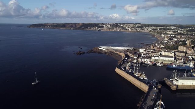 Wider panoramic view of Penzance and the surrounding coastal villages along the bay to the west. Mousehole and Newlyn