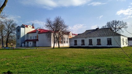 Village school with playground at spring