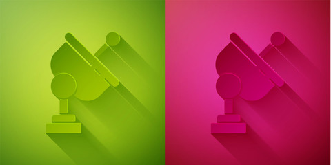 Paper cut Radar icon isolated on green and pink background. Search system. Satellite sign. Paper art style. Vector Illustration
