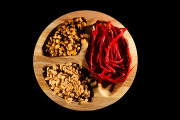 Party mix plate with snack. meat, cracker, corn and peanut