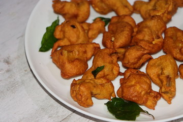 Button mushroom fritters, pakora or pakoda, Indian food