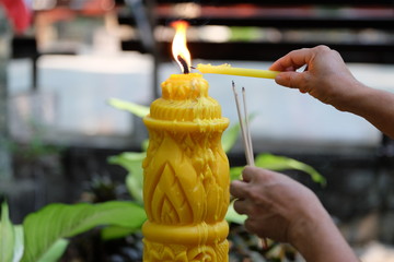 The large wax carving candles in the temple are popular for Thai religious ceremonies.