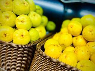 Different pears in the tray in the store. A close-up. Mobile photo.