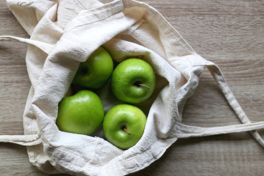 Green Apples In A Reusable Canvas Bag. Top View.