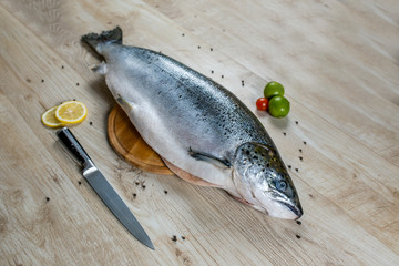 salmon on table with knife