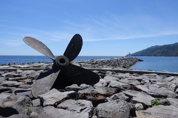 Rusty propellor near the port