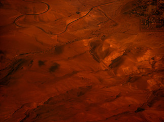 Photo of desert from the plane. View from above.  Situational plan with alien landscape.