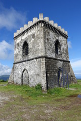 Fototapeta na wymiar Small watchtower on top of a mountain