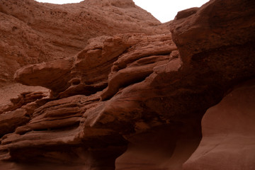 Red canyon, Israel - December, 2019. Desert landscape near Eilat with rocks in the afternoon.