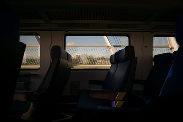 traveling in a train while looking outside