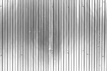 Metal list wall texture of fence in black and white.