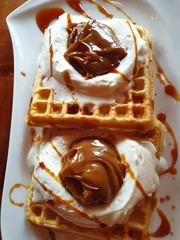 Freshly baked waffles with creamy dulce de leche