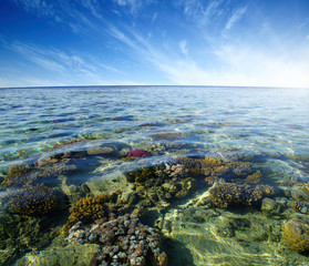 Red sea coral reef and sky.