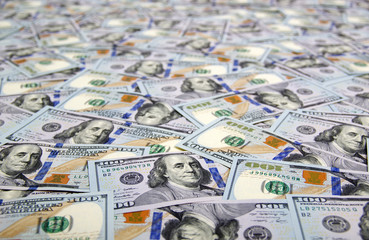 A pile of hundred dollar