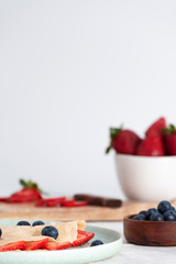 Sweet crepes, strawberries and blueberries for Breakfast.