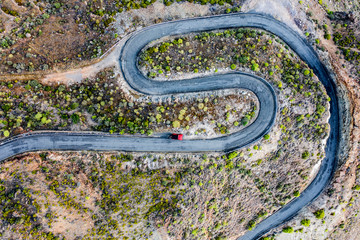 A unique road among high mountains in a beautiful mood of nature