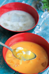 cold soursop and mangoo juices in a bowl