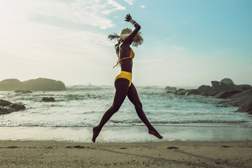 Woman enjoying herself at the beach