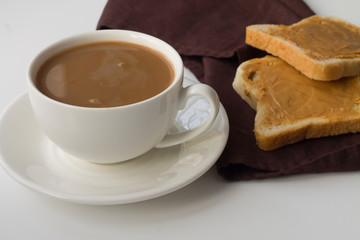 Healthy breakfast, coffee and bread with peanut butter