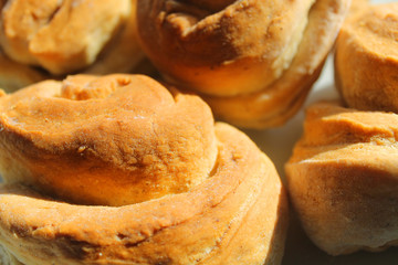 French buns. Fresh crisp bakery. Close up bread background. Delicious Flavored Buns.