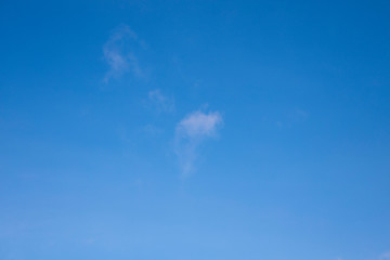 Beautiful white Cirrus clouds in a blue sky. Background and texture of the sky