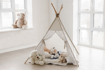 Children's hut with toys in the room. Interior of the children's room.