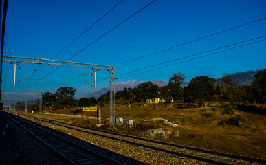 Fototapeta premium Train reaching at beautiful and clean katra railway station of Jammu, railway track 