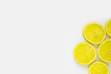 A few slices of lemon on a white background