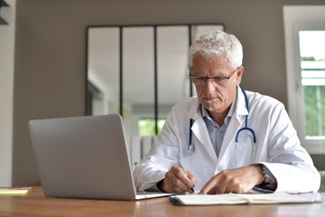 Portrait of doctor working in the office