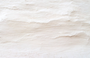 Blank concrete wall white color for texture background. White wall with bumps and scuffs