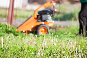  Professional lawn mower cutting grass