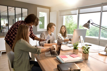 Group of students working together on project