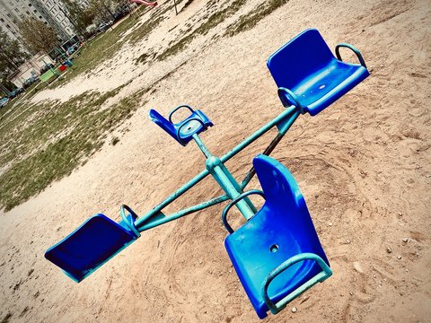 Old swings in the yard. Photo from mobile in the Republic of Belarus.