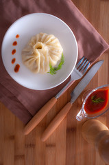 A delicious, diet dish. Steam dumplings. Khinkali Georgian.